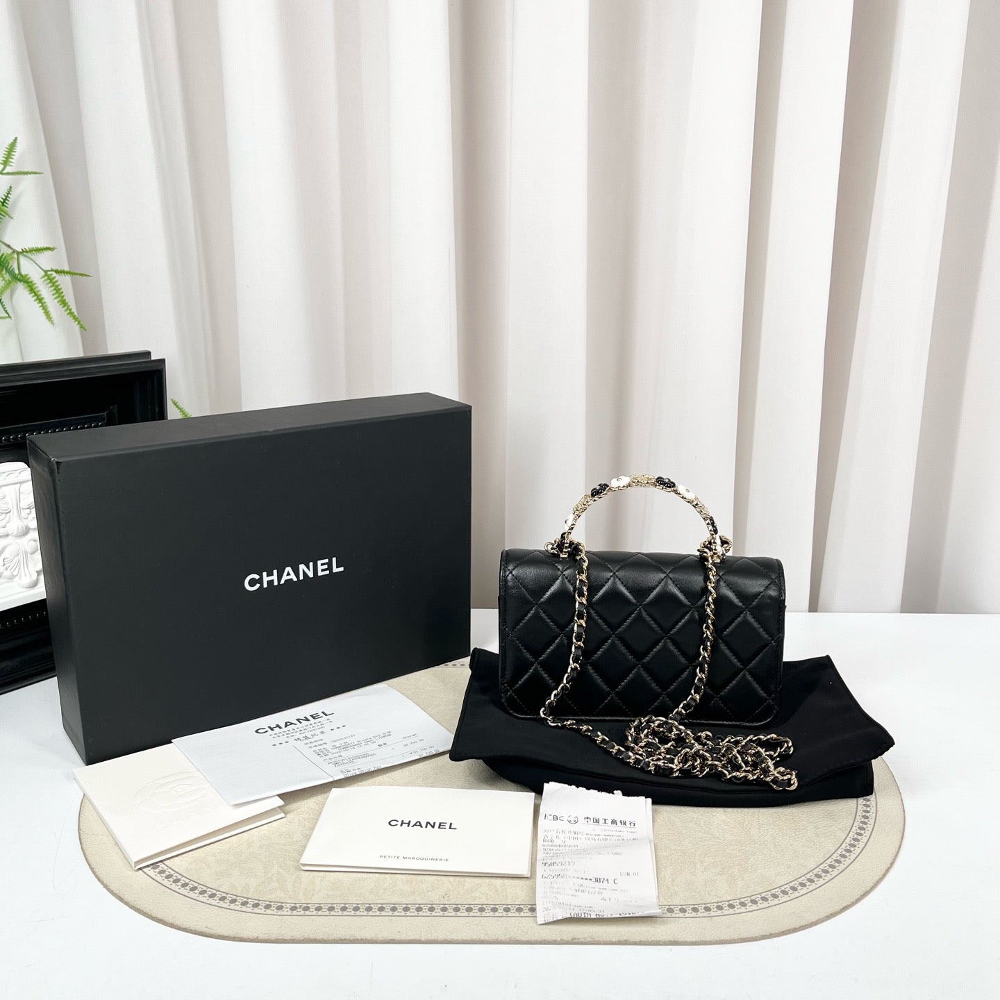 CHANEL Black Camellia Handle Mini WOC Chain Bag