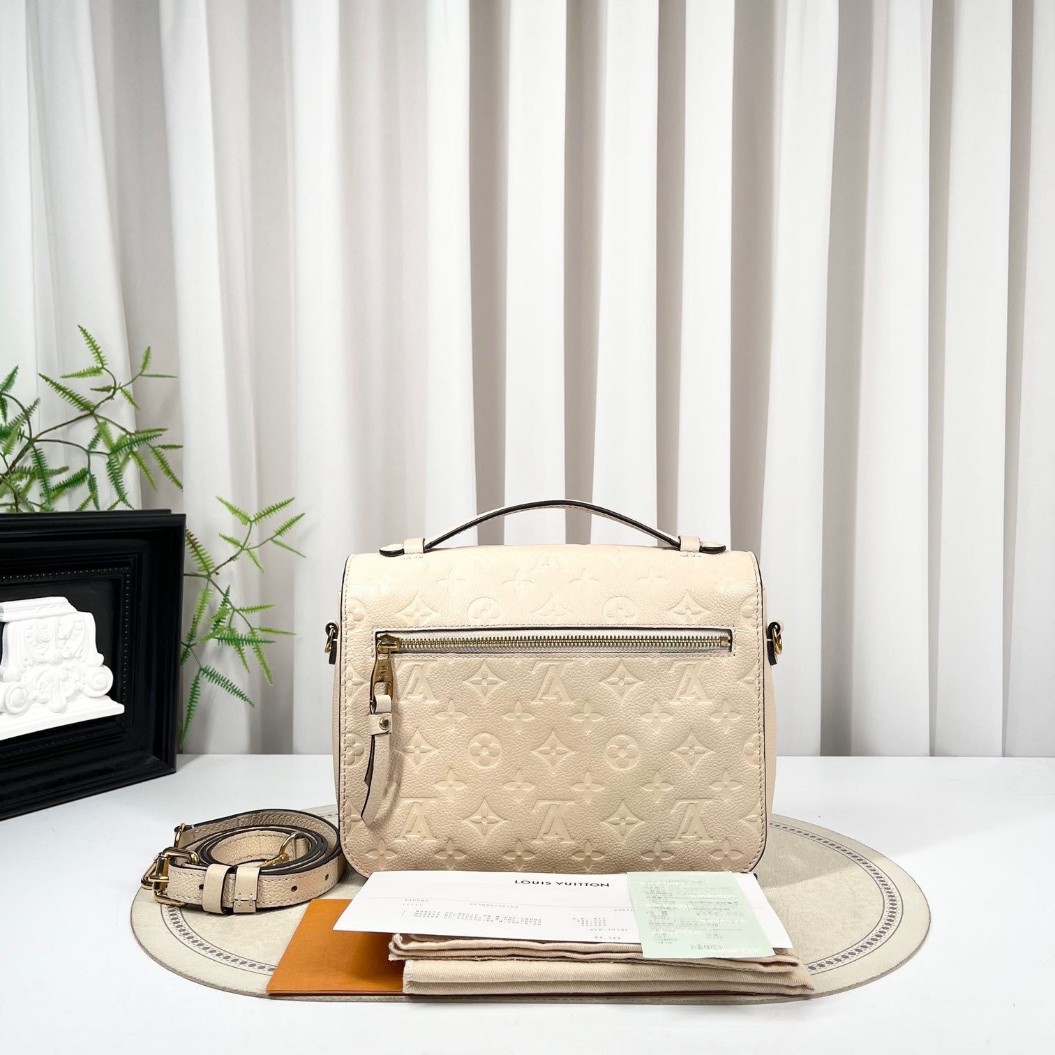 LOUIS VUITTON Empreinte Crossbody Bag