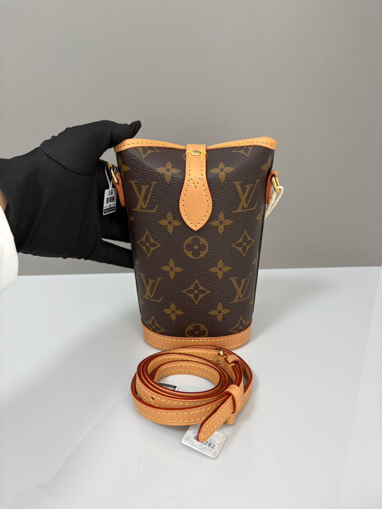 Louis Vuitton Monogram Fold Me Mini Bucket Bag