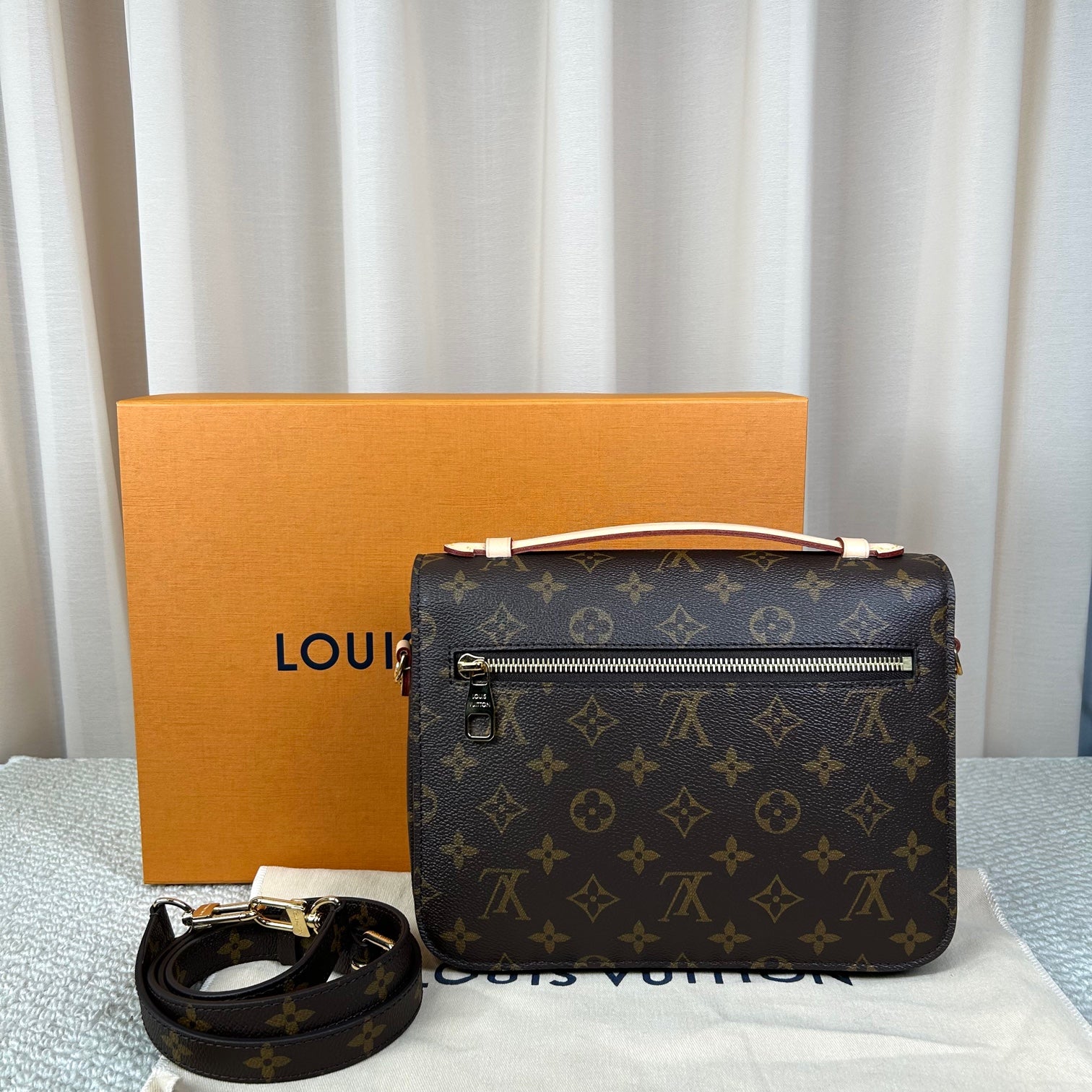 Louis Vuitton Pochette Metis Reverse Monogram Bag