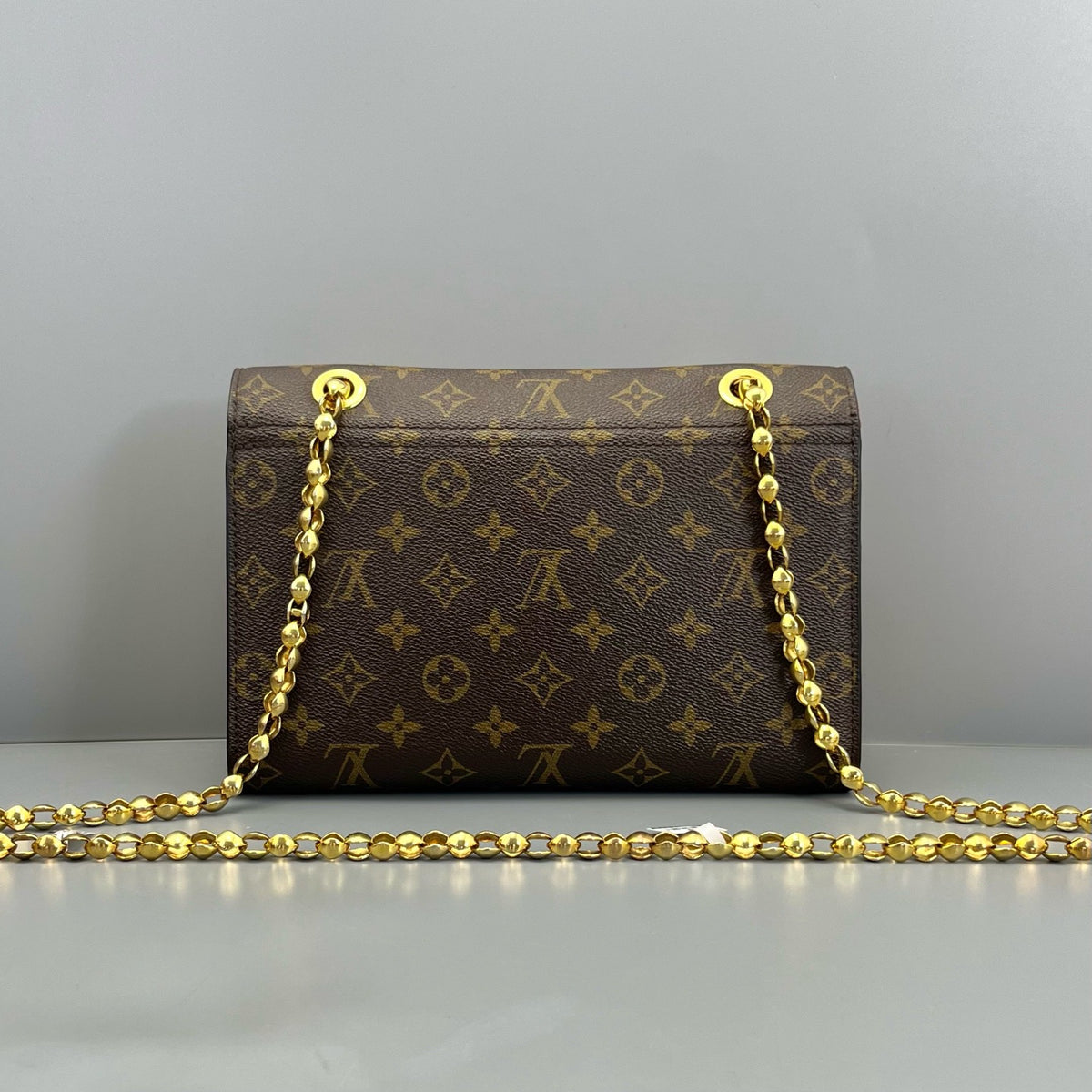 Louis Vuitton Monogram & Red Leather Victoire