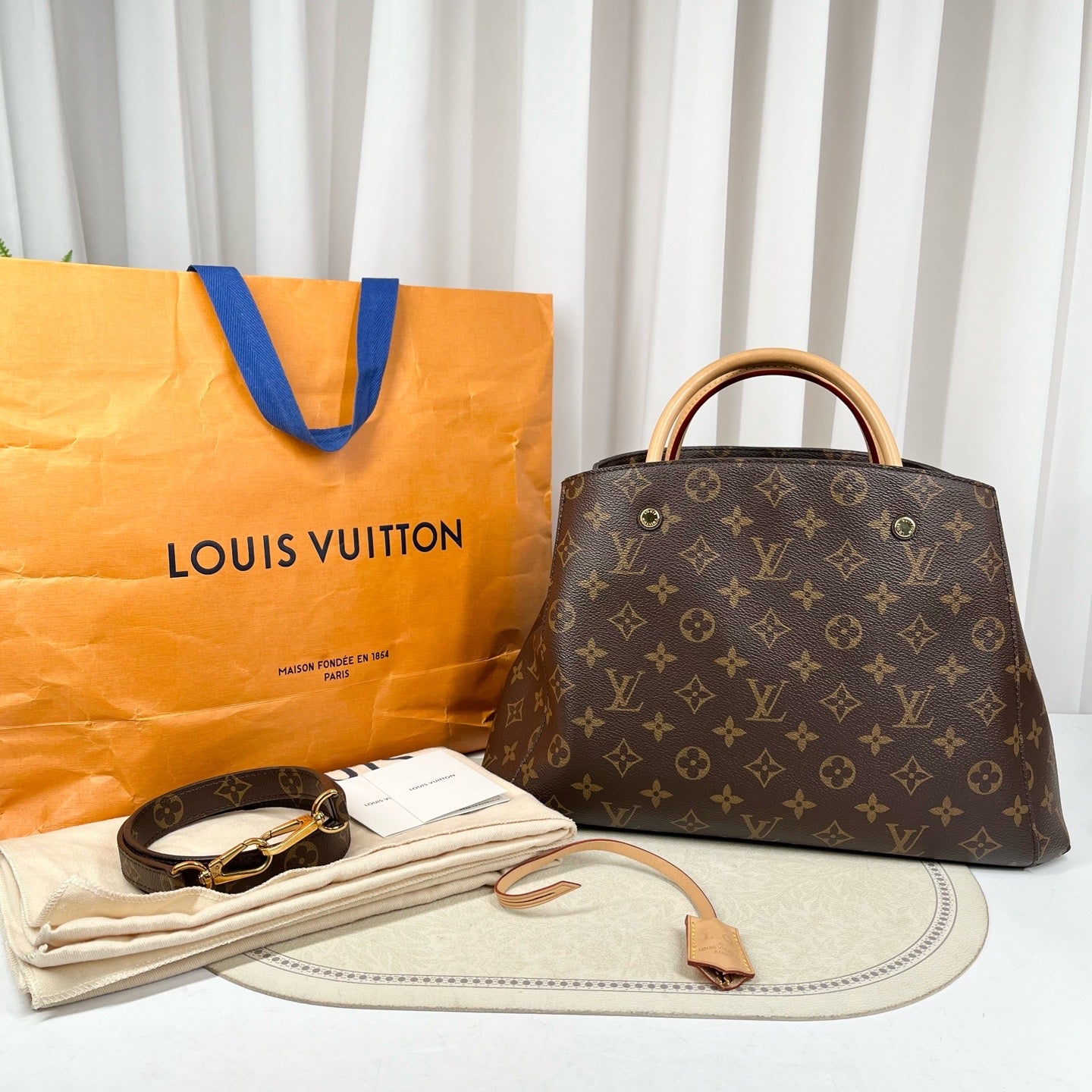 LV Montaigne MM Monogram Canvas