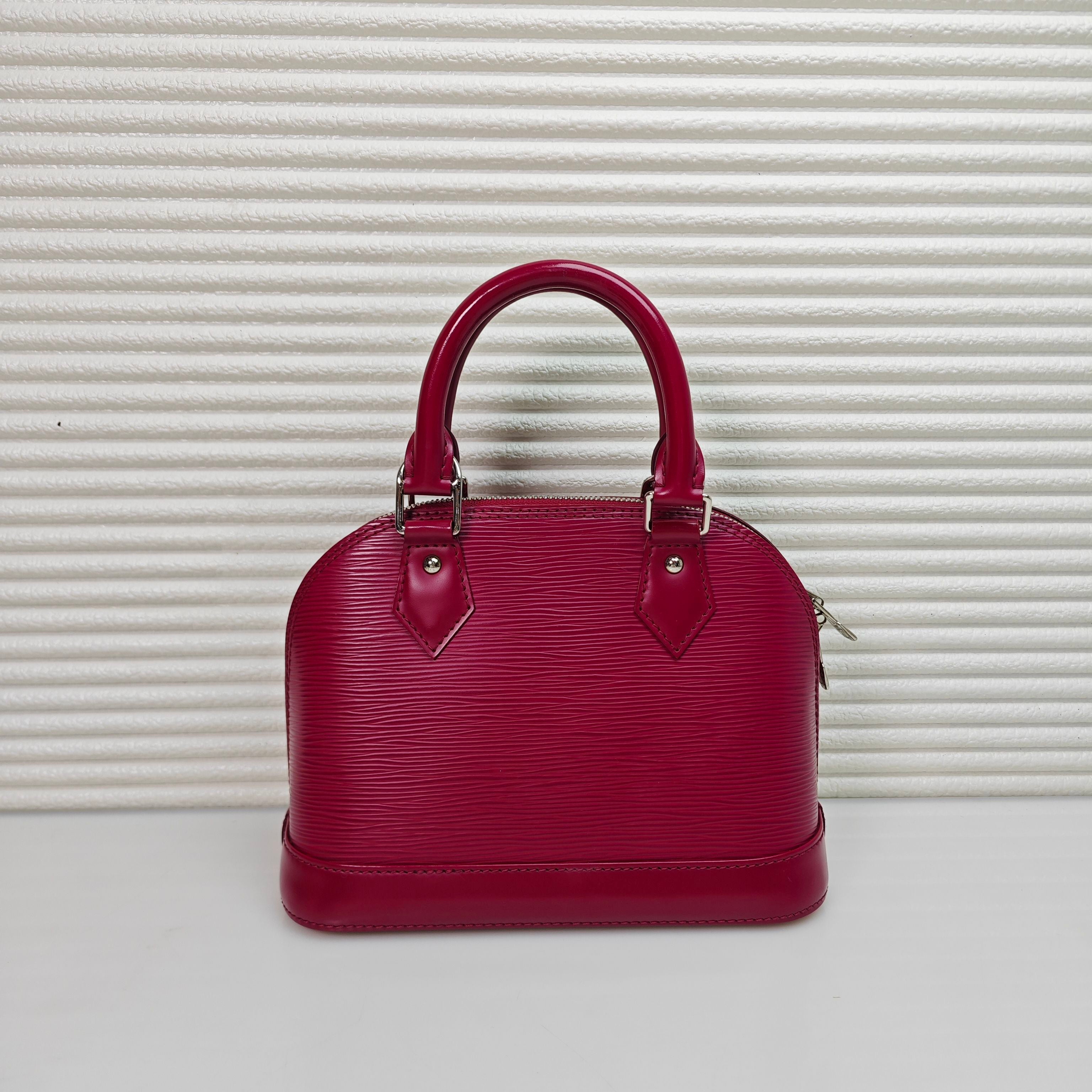 Louis Vuitton Alma BB Fuchsia Epi Leather Handbag