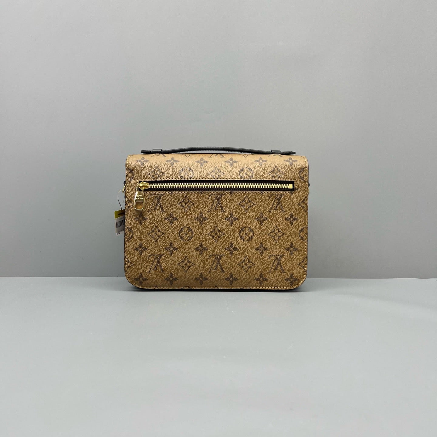 Louis Vuitton Pochette Metis Monogram Reverse Canvas Handbag