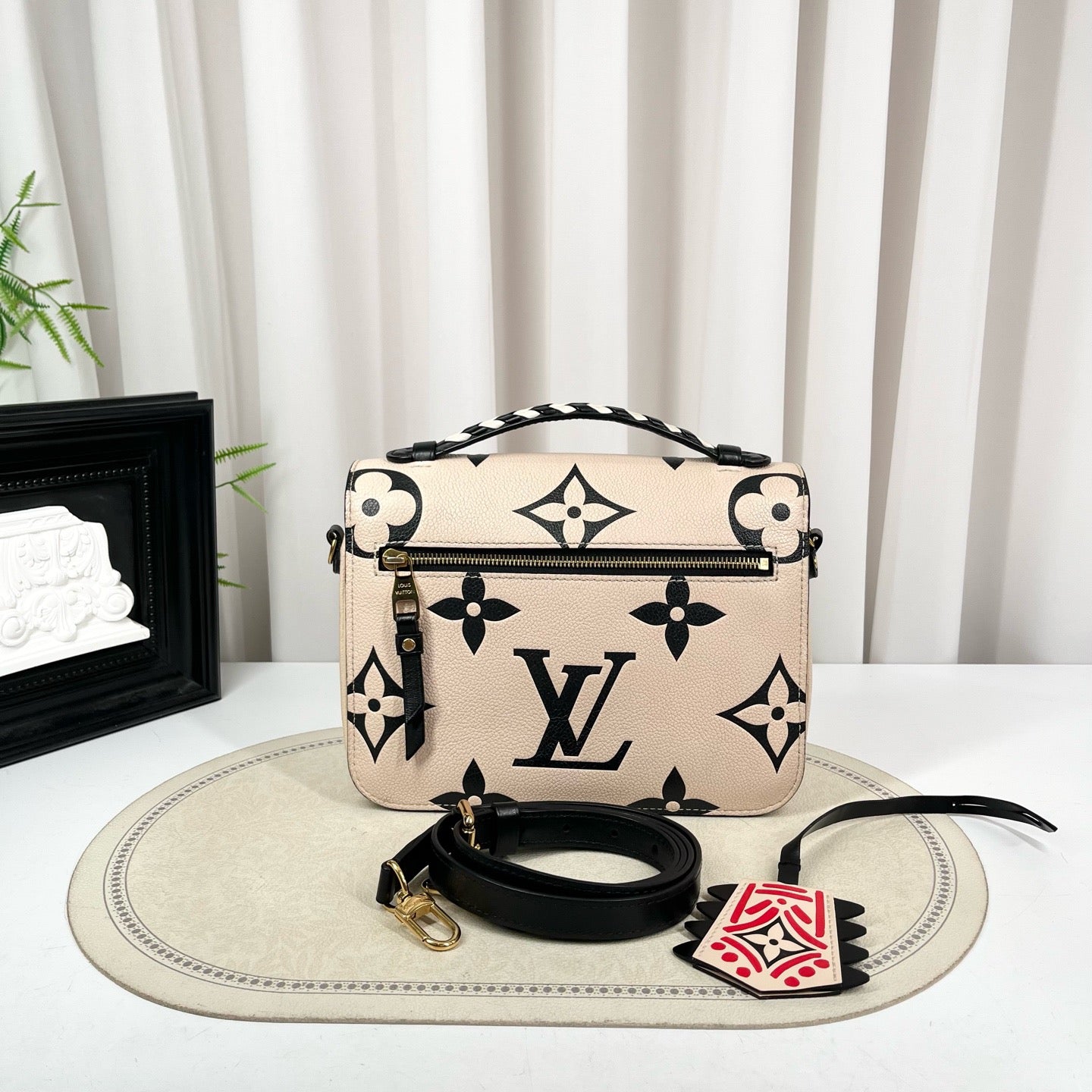 Louis Vuitton Pochette Metis Crafty Embossed Leather Bag