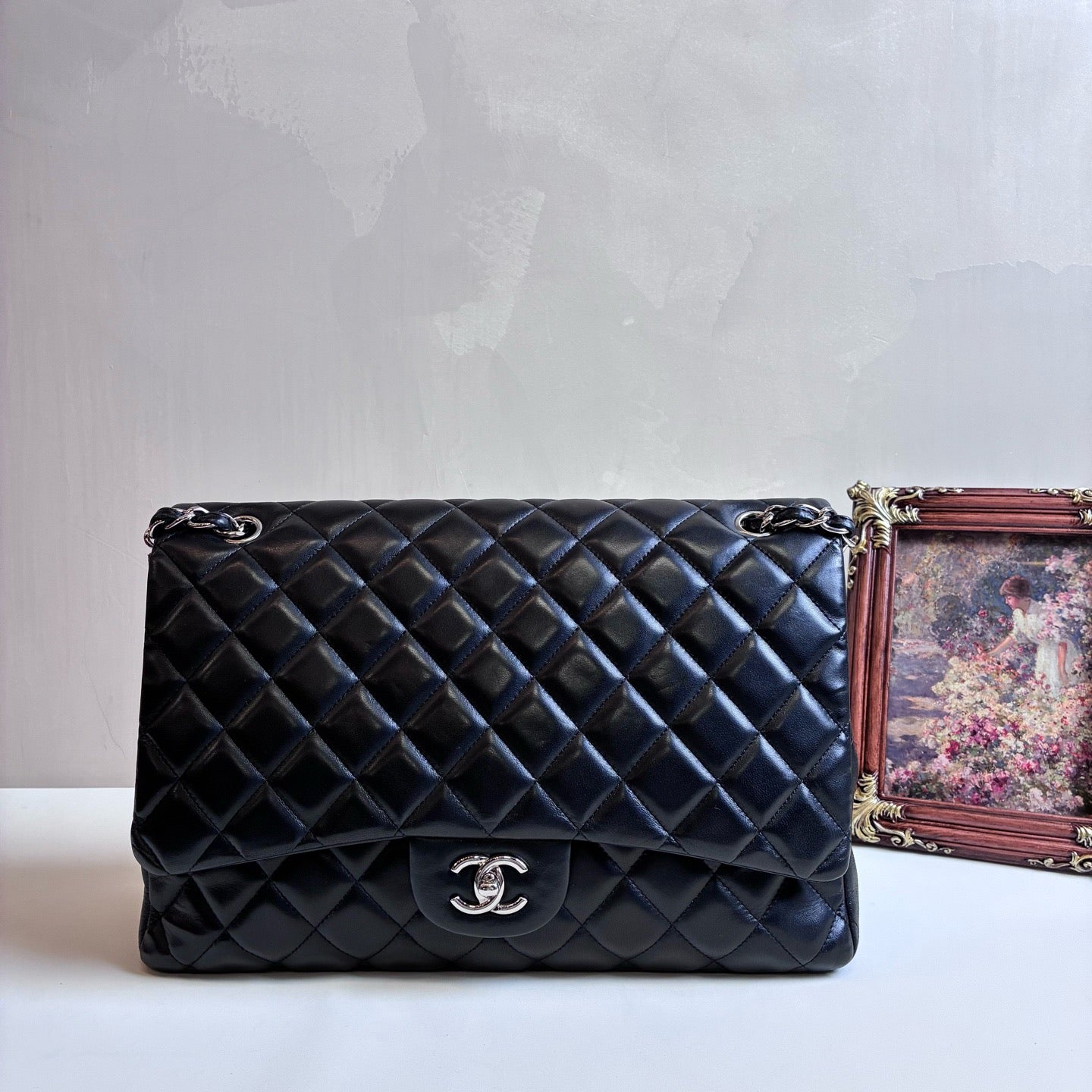 Chanel Maxi Classic Flap Bag in Black Lambskin with Silver