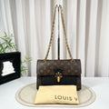 Louis Vuitton Victoire Monogram Canvas & Black Leather