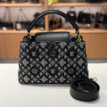 Louis Vuitton Capucines MM 1854