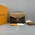 Louis Vuitton Pochette Metis Monogram Reverse Canvas Handbag