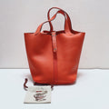Hermès Picotin Lock 22 Bucket Bag in Orange TC Clemence