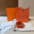 Hermès Mini Evelyne Crossbody Bag in Classic Orange