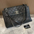 Chanel Classic Maxi Flap Bag Black Caviar Leather 33cm