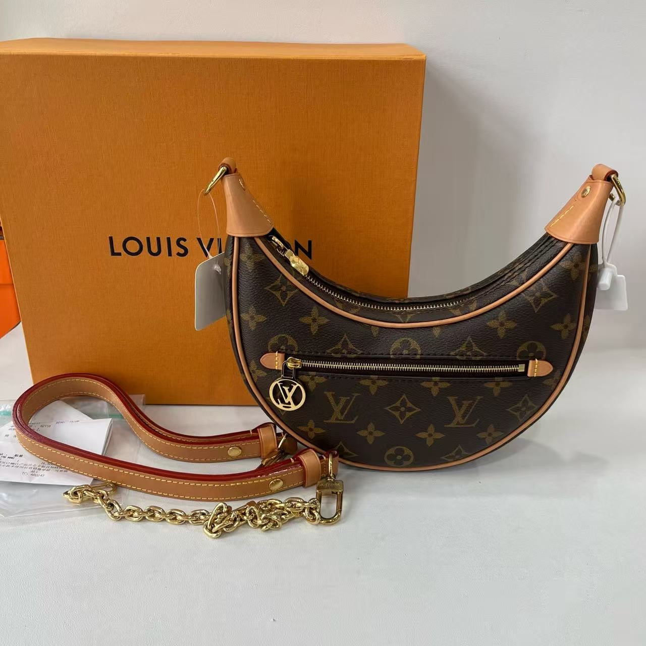 Louis Vuitton loop microchipped
