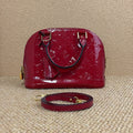 Louis Vuitton Alma BB Monogram Vernis Red Gold‑toned