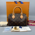 Louis Vuitton Monogram Speedy 20 Handbag