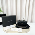 CHANEL Black Camellia Handle Mini WOC Chain Bag