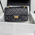 Chanel Mini Reissue 2.55 Handbag in Black Crinkled Oil Wax