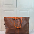 Authentic Yves Saint Laurent YSL Brown Orange Whip‑Stitch Leather Large Tote with Pouch